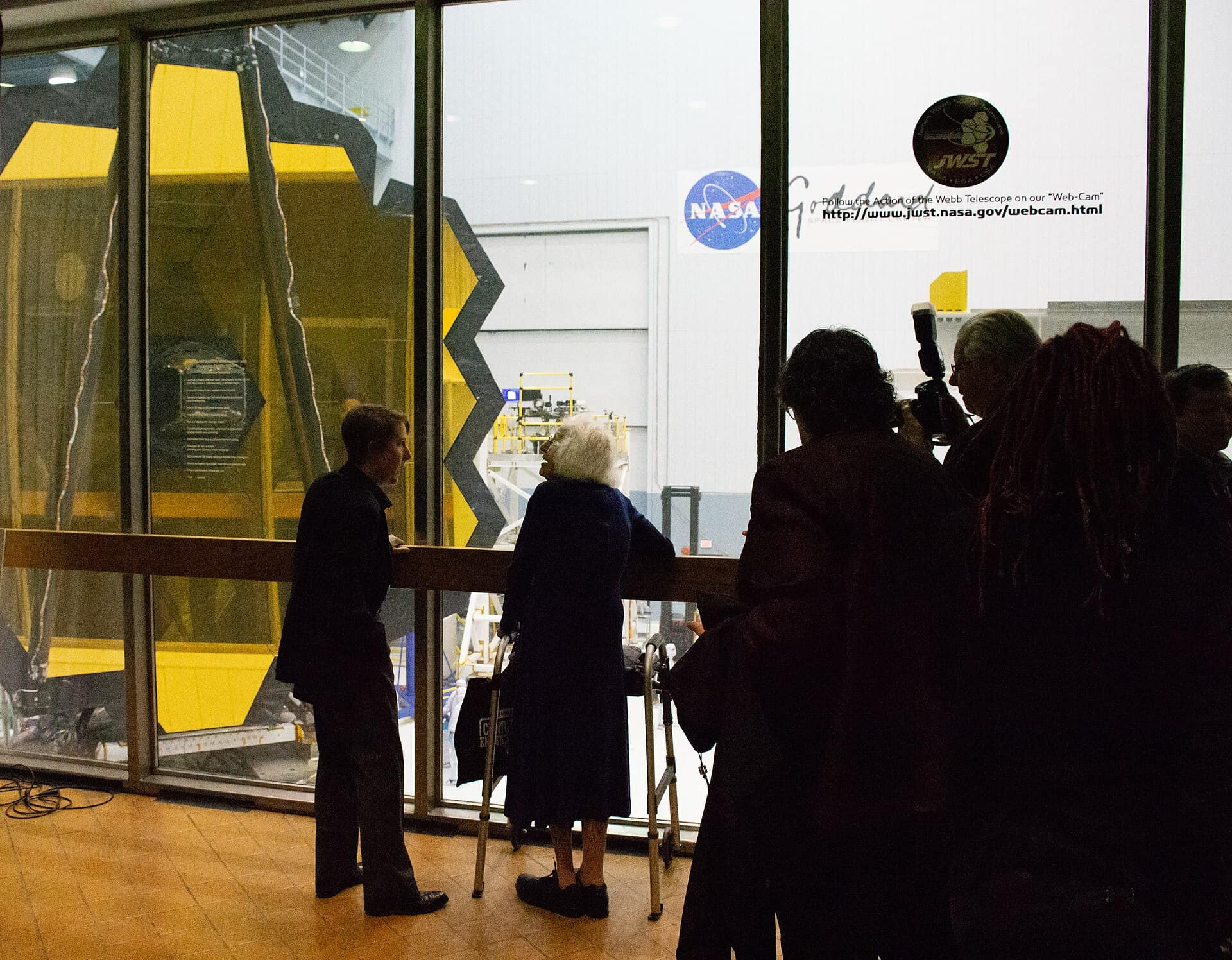 Dr. Nancy Grace Roman is seen here visiting the James Webb Space Telescope (JWST) alongside astrophysicist, Dr. Jane R Rigby outside the clean room at NASA's Goddard Space Flight Center in Greenbelt, Md on Friday, March 31, 2017. Dr. Nancy Grace Roman was the first Chief of Astronomy in the Office of Space Science at NASA Headquarters and the first woman to hold an executive position at NASA. In her role, she had oversight for the planning and development of programs including the Cosmic Background Explorer and the Hubble Space Telescope. Dr. Roman received her PhD in astronomy from the University of Chicago in 1949 and joined NASA in 1959. She finished her NASA career at Goddard Space Flight Center where she served as the manager of the Astronomical Data Center. After retiring from NASA in 1979, she continued working as a contractor at Goddard. Throughout her career, Dr. Roman has been a spokesperson and advocate of women in the sciences. Credit: NASA/Goddard/Rebecca Roth NASA image use policy. NASA Goddard Space Flight Center enables NASA’s mission through four scientific endeavors: Earth Science, Heliophysics, Solar System Exploration, and Astrophysics. Goddard plays a leading role in NASA’s accomplishments by contributing compelling scientific knowledge to advance the Agency’s mission. Follow us on Twitter Like us on Facebook Find us on Instagram
